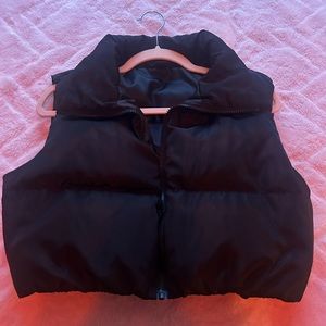 Cropped black puffy vest